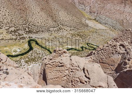 View Down A Canyon To The Green Anakonda Snake River In Bolivia