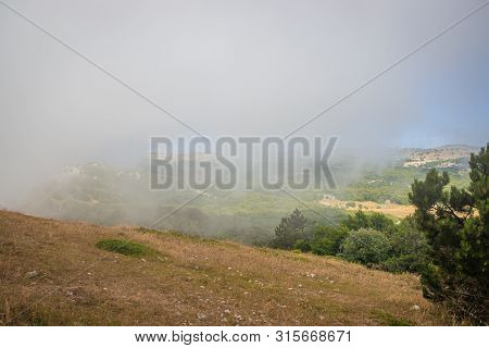Ai-petri Mountain In The Fog. High Mountain. Crimea. Russian Mountains. Low Clouds. Beautiful Mounta