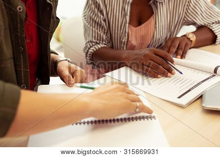 Young Male Visiting Private Tutorial In Language School