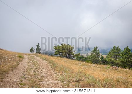 Ai-petri Mountain In The Fog. High Mountain. Crimea. Russian Mountains. Low Clouds. Beautiful Mounta