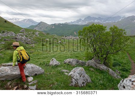 Hiker Woman With A View Of Tena Valley In The Pyrenees, Formigal,  Huesca, Spain