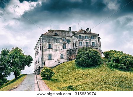 Beautiful Old Castle On A Cloudy Sky Background. Ukraine. Attractions. Travels. Architecture. Castle