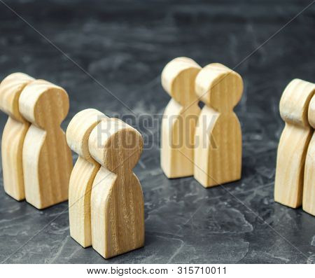 Groups Of Wooden People. The Concept Of Market Segmentation. Marketing Segmentation, Target Audience
