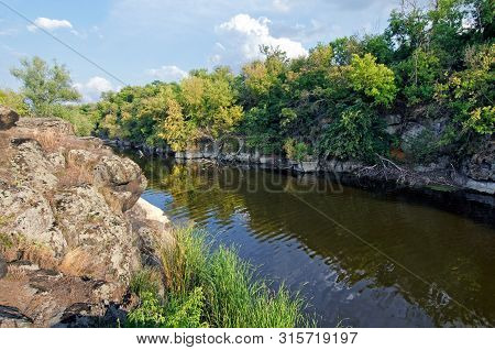 Stone Cliff On The River Bank In Tyasminsky Canyon. Kamianka Cherkasy Region. Ukraine