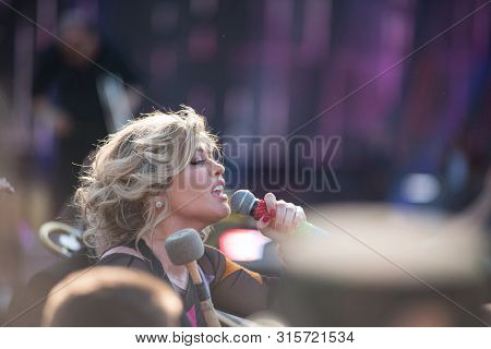 Woman Vocalist Singing Live