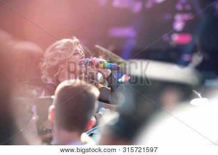 Woman Vocalist Singing Live