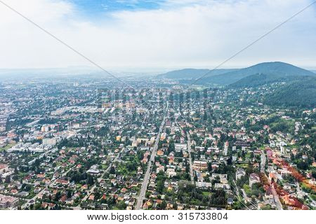 Aerial View Of City Graz From Helicopter Drone With District Eggenberg On A Cloudy Summer Day In Aus