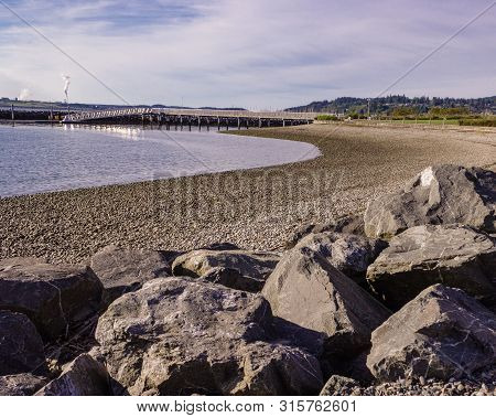 Morning Light On Rocky Beach At Seafares Park, Anacortes, Washington