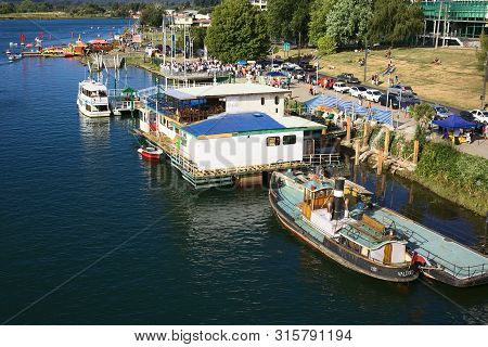 Valdivia, Chile - February 3, 2016: Promenade And Boats Along The Valdivia River Photographed From P
