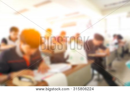 Abstract blurr people lecture in seminar room, education concept,blurry instructor teaching in schoo