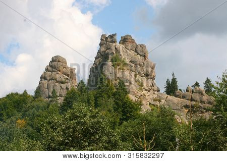 Stone Mountain In The Middle Of The Forest.