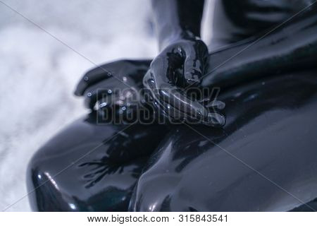 Man In The Latex Rubber Black Catsuit With Gasmask