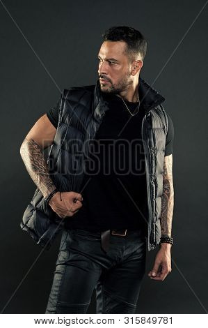 Tattoo Brutal Attribute. Man Brutal Unshaven Hispanic Appearance Tattooed Arms. Bearded Man Posing W