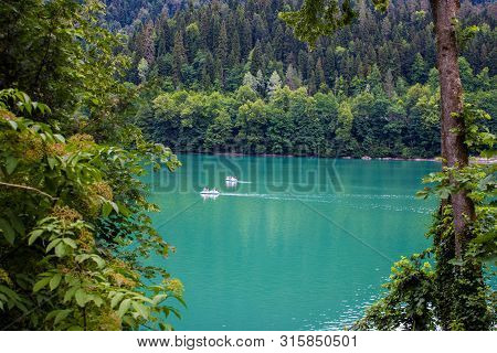Beautiful Mountain Lake Ritsa. Ritsa Lake In The Mountains Of The Caucasus, In The Northwestern Part