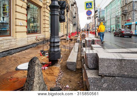 St. Petersburg, Russia - August 03, 2019: Large-scale Repair Of The Sidewalk On Bolshoi Prospect Of 