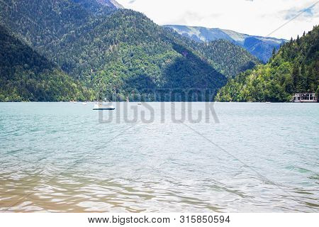 Beautiful Mountain Lake Ritsa. Ritsa Lake In The Mountains Of The Caucasus, In The Northwestern Part