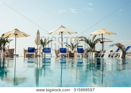 Swimming Pool At Luxury Resort, Hotel. 
Stock Photo