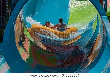 Orlando, Florida. July 28, 2019. People Having Fun Kare Kare Curl At Aquatica 1
