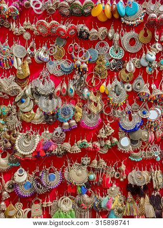 Bunch Of Indian Style Earrings Or Jhumkas For Sale.