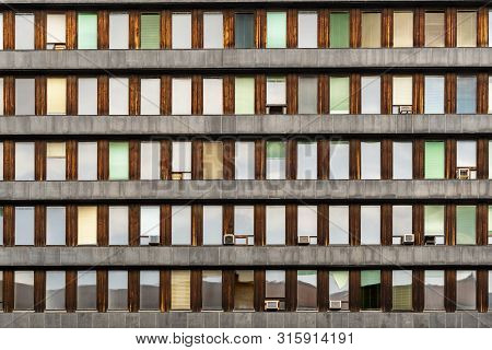 Evening Reflections On Small Aligned Windows. Architecture Details.