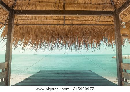 A Beach Hut On Thebeach,tropical Sea Beach Bungalow On Tropical Beach Scene.