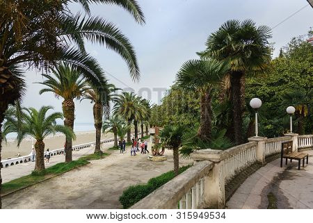 Gagra, Abkhazia - May 02, 2019: View From The Colonnade On Ardzinba Avenue Towards The Sea And The S