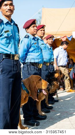 KATHMANDU, NEPAL - NOVEMBER 6, 2018: Nepal police celebrates Kukur Tihar (dog festival) at Central Police Dog Training School.