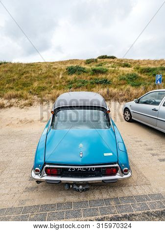 Overveen, Netherlands - Aug 16, 2019: Rear View Of Luxury Vintage Old Blue Citroen D Special Limousi
