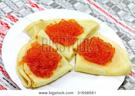 Tasty Pancakes With Soft Caviar On The Plate