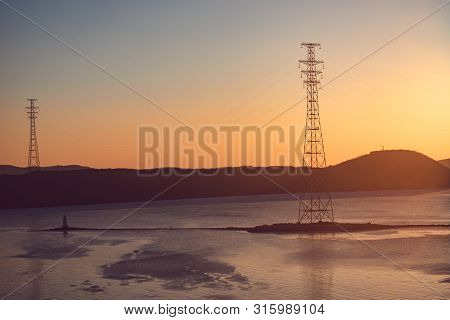 Seascape With A Beautiful Sunset Over The Tokarev Lighthouse. Vladivostok, Russia