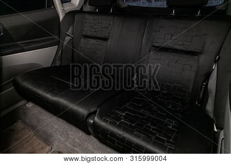 Novosibirsk, Russia - July 17, 2019:  Toyota Opa , Close-up Of The Black  Rear Seats With Seats Belt
