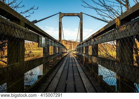 The Boat Weil Wooden Suspension Bridge Over The Water Of Ken At St.john's Town Of Dalry, Scotland