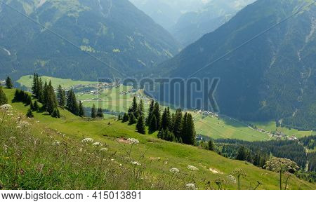 Beautiful Alpine Landscape With Green Meadows, Alpine Cottages And Mountain Peaks, Lechtal, Lech, Au