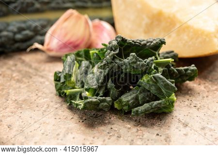 Cooking With Black Flat Leaves Of Cavolo Nero Tuscan Cabbage