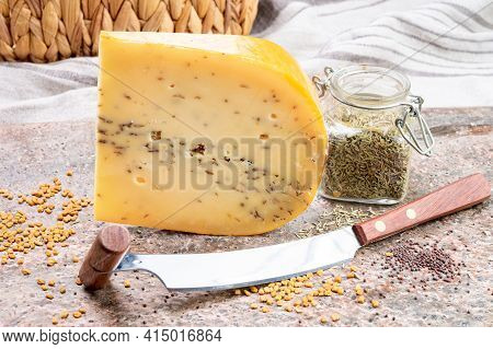 Cheese Collection, Piece Of Hard Yellow Dutch Gouda Cheese With Dried Caraway Or Cumin Seeds