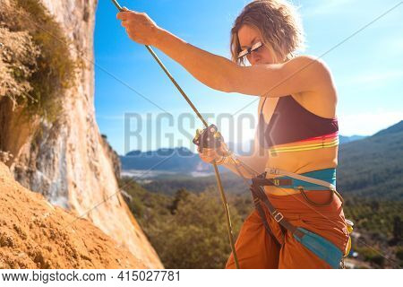 Woman Stands On A Large Rock And Belays The Climber, Climbing In Turkey, Partner Belaying, Belay Dev