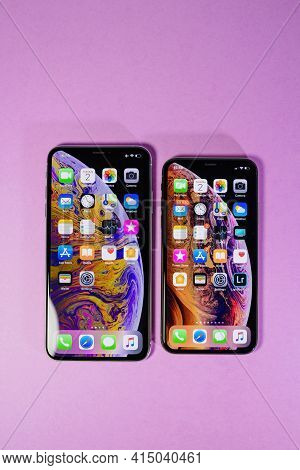 Paris, France - Oct 2, 2018: View From Above At Two Latest Apple Computers Iphone Xs Gold Color 256 