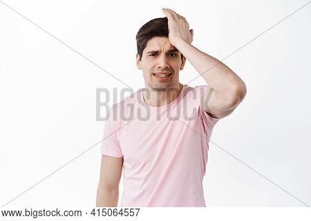 I Am In Trouble. Worried Man Hold Hand On Forehead And Frowning Upset, Forget Remember Imporant Thin