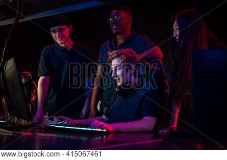 During An Esports Training Session, A Team Of Boys And Girls Sort Out The Latest Game And Smile