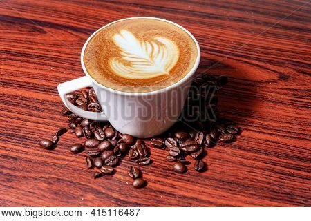 Coffee Beans In A Mug, Cup Of Coffee Full Of Coffee Beans, Coffee Cup With Roasted Beans On Stone Ba