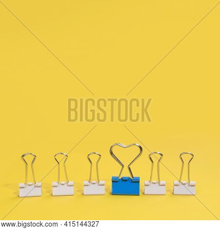 Arrangement Paper Clips With One Blue Paper Clip. High Quality And Resolution Beautiful Photo Concep