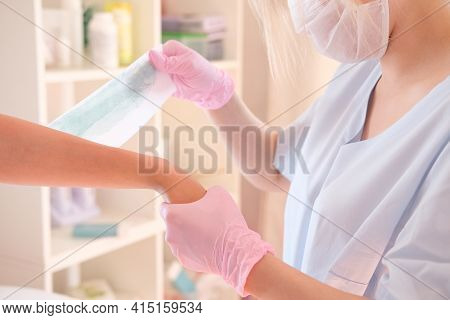 Waxing Salon Or Spa. Hair Removal Using Wax.Concept - sugar paste or hair removail.