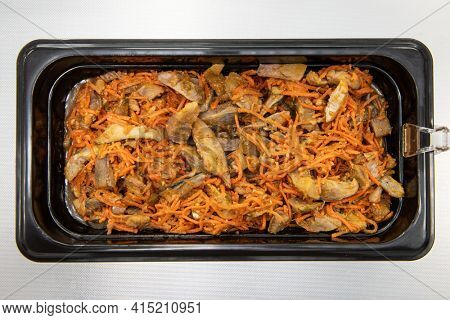 Marinated korean Hwe salad with zander fish in plastic container