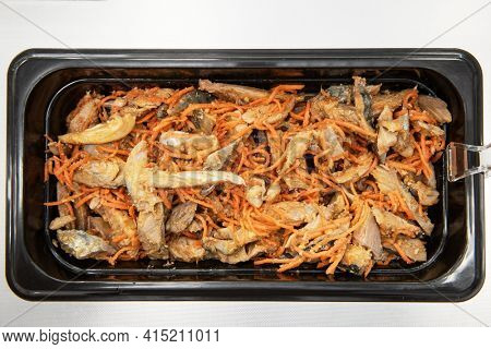 Marinated korean Hwe salad with mackerel fish in plastic container