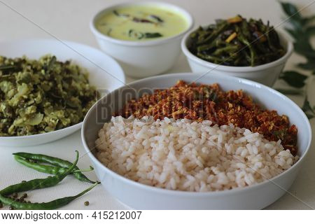 Kerala Style Veg Meals Including Boiled Matta Rice, Red Carrot Thoran, Beans Stir Fry, Green Gram Bo