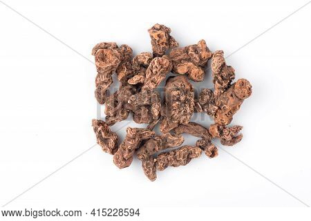 Top View Of The Roots Of Galangal. Background From Galangal Roots. Galangal Root Is Used In Cooking,