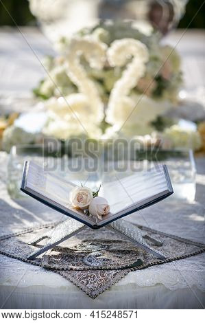 Book Of Poetry Set On A Decorated Table For A Persian Wedding Ceremony