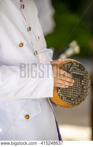 Spike Fiddle, Tro, Being Played By A Musician At A Cambodian Wedding Ceremony