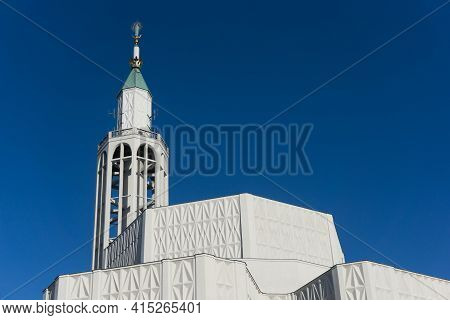 Saint Roch Church In Bialystok City In Poland. White Catherdal Building. Empty Copy Space Blue Sky. 