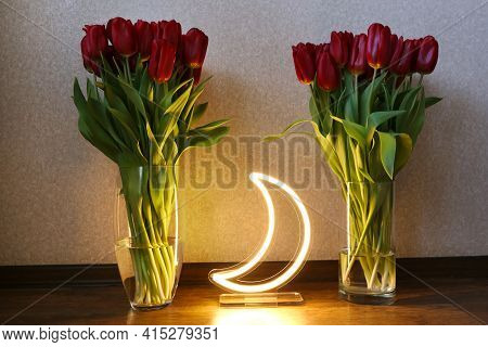 Neon Moon Sign With Beautiful Red Tulips. Trendy Style. Floral Background.neon Sign. Custom Neon. Ho